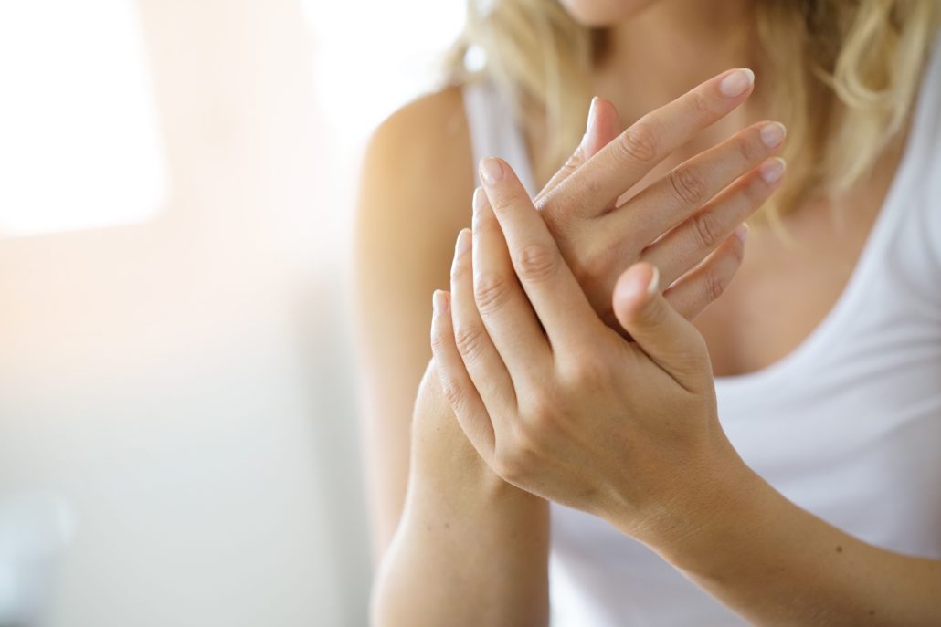 Closeup,On,Woman's,Hands,Applying,Moisturizing,Hand cream,On